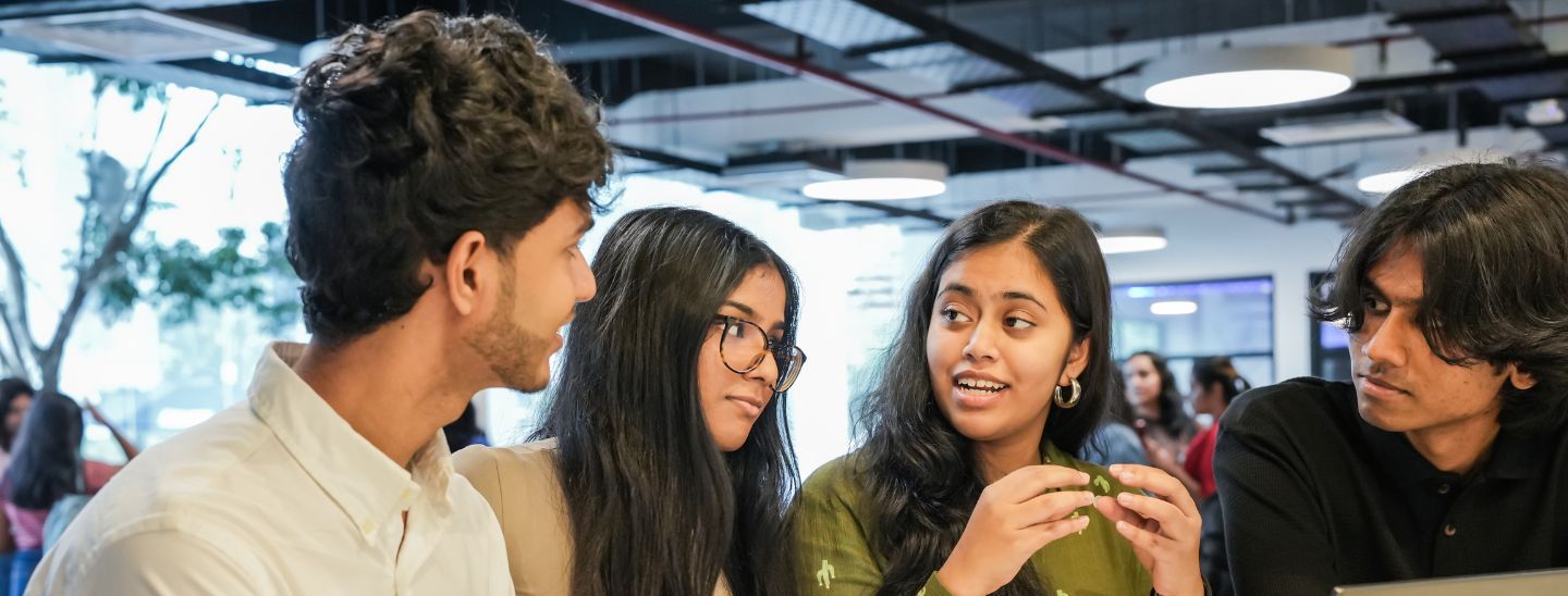 Students group talking in the classroom