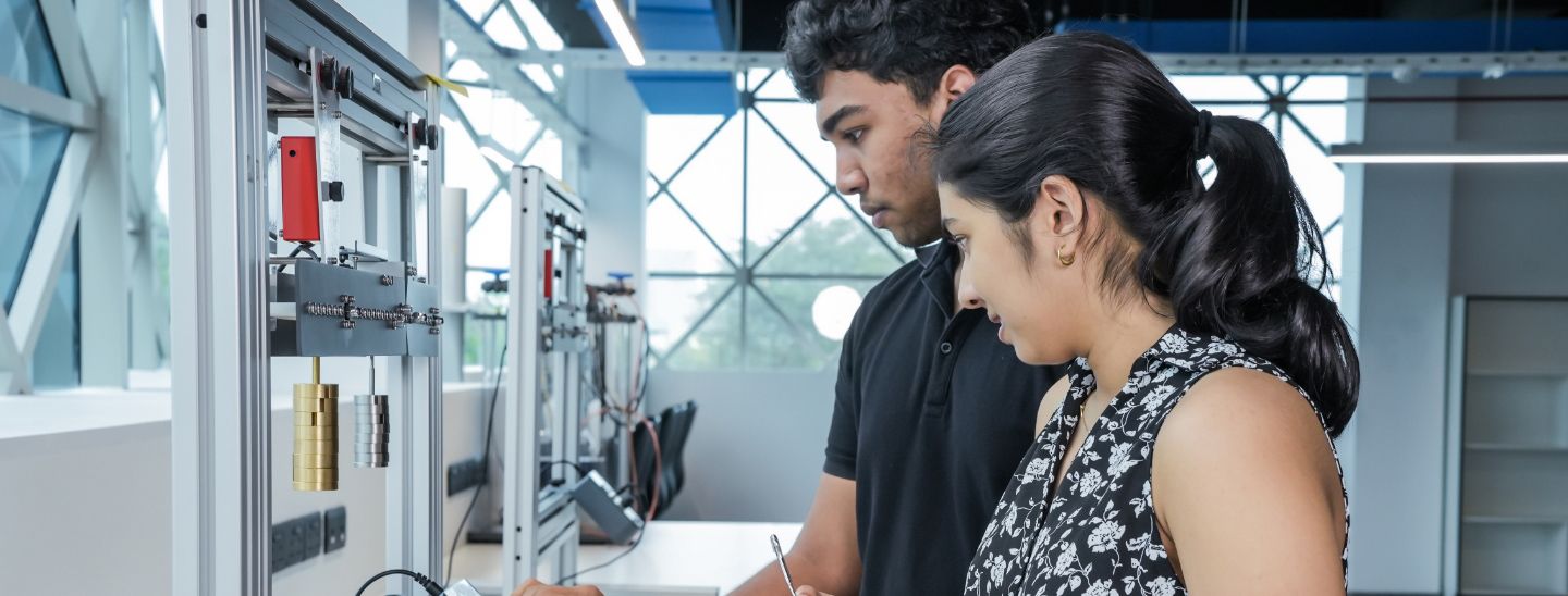 Students doing experiments in Electronic lab