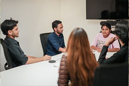 Student sitting and talking