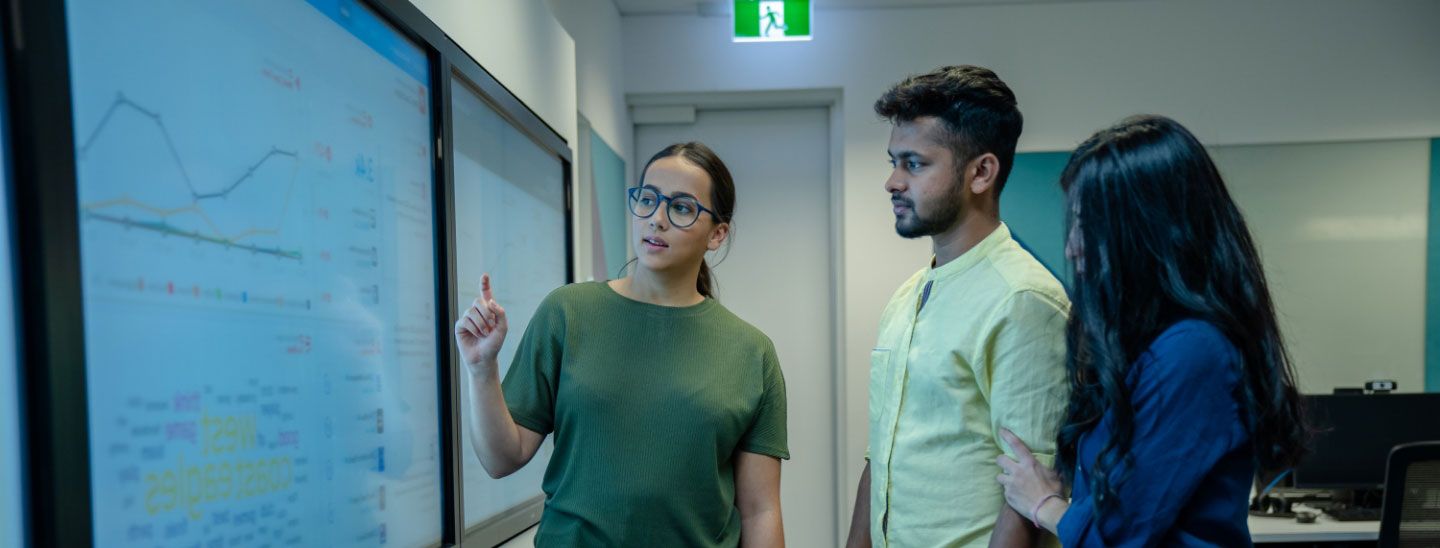 Students studying working together in classroom