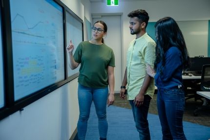 Students studying working together in classroom