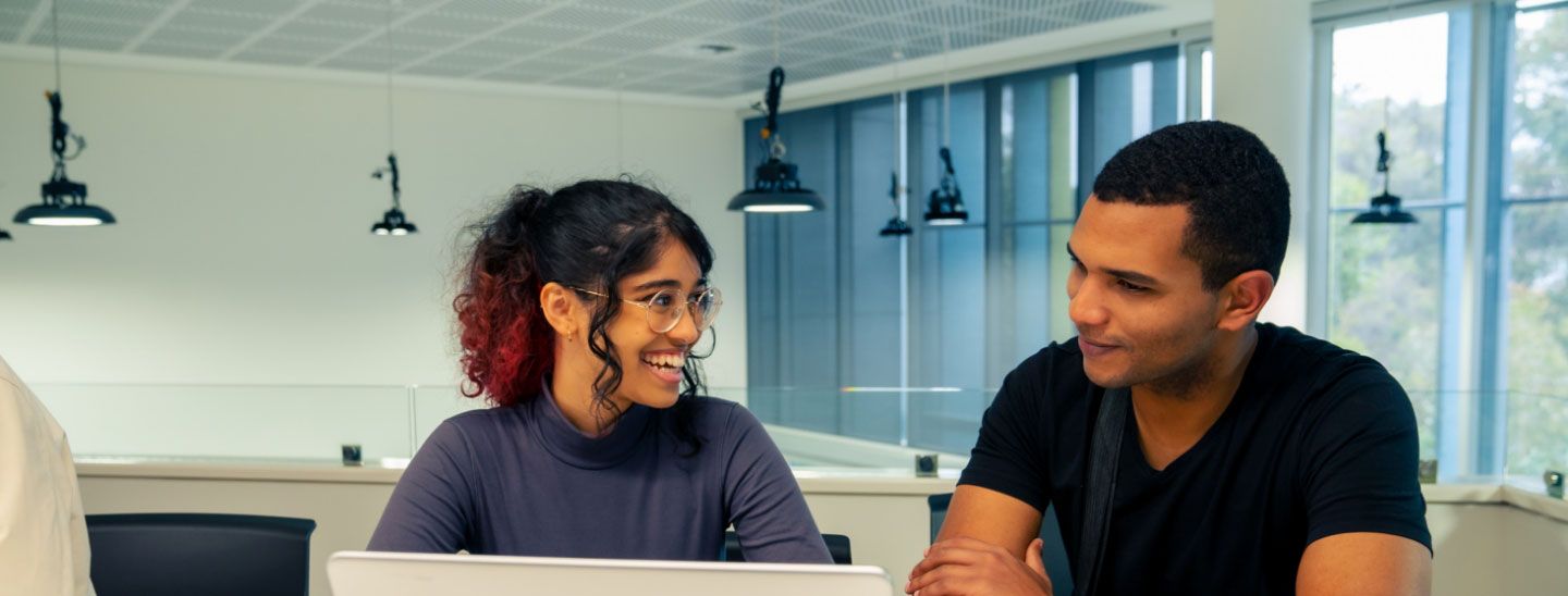 Students working together in class